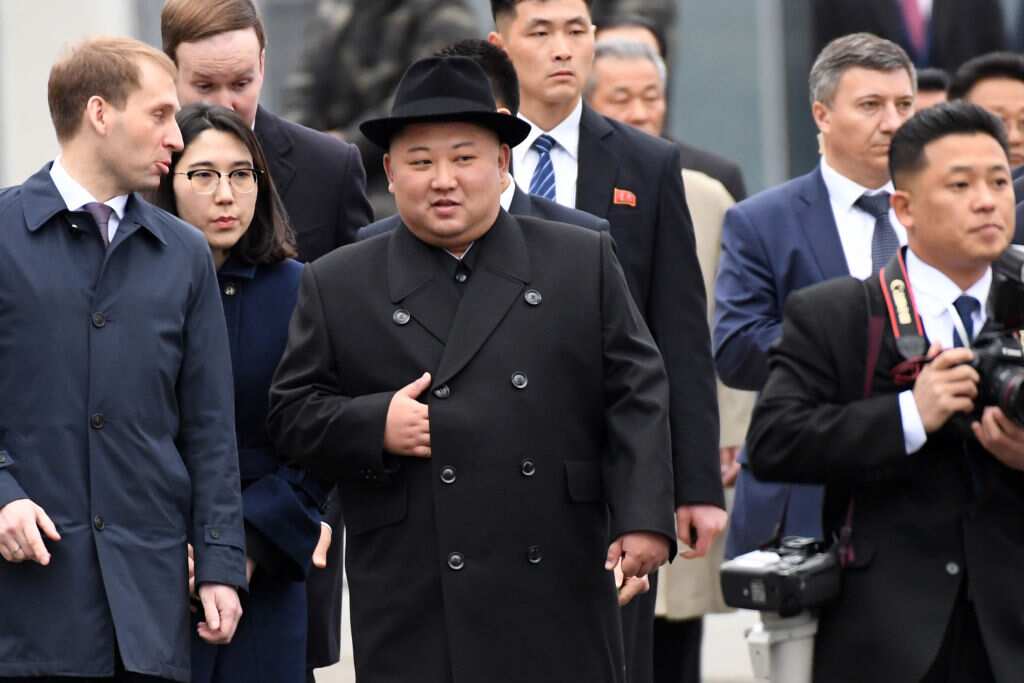 Kim Jong-un walks upon arrival at the railway station in the far-eastern Russian port of Vladivostok.