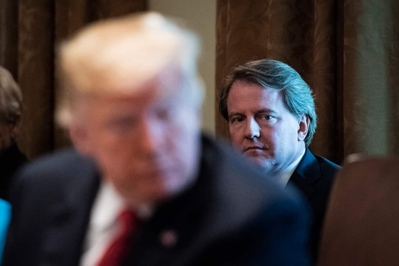 White House Counsel Don McGahn listens as President Donald J. Trump speaks.