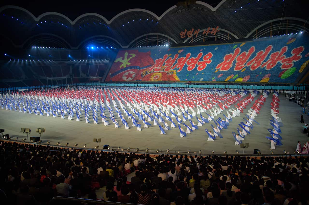 A photo taken on June 4, 2019 shows a 'Grand Mass Gymnastics and Artistic Performance', or mass games, at the May Day stadium in Pyongyang. - The "Grand Mass Gymnastics and Artistic Performance" features enormous numbers of people -- mostly students and c