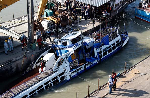 Recovery Crews Raise Sunken Tourist Boat From Danube