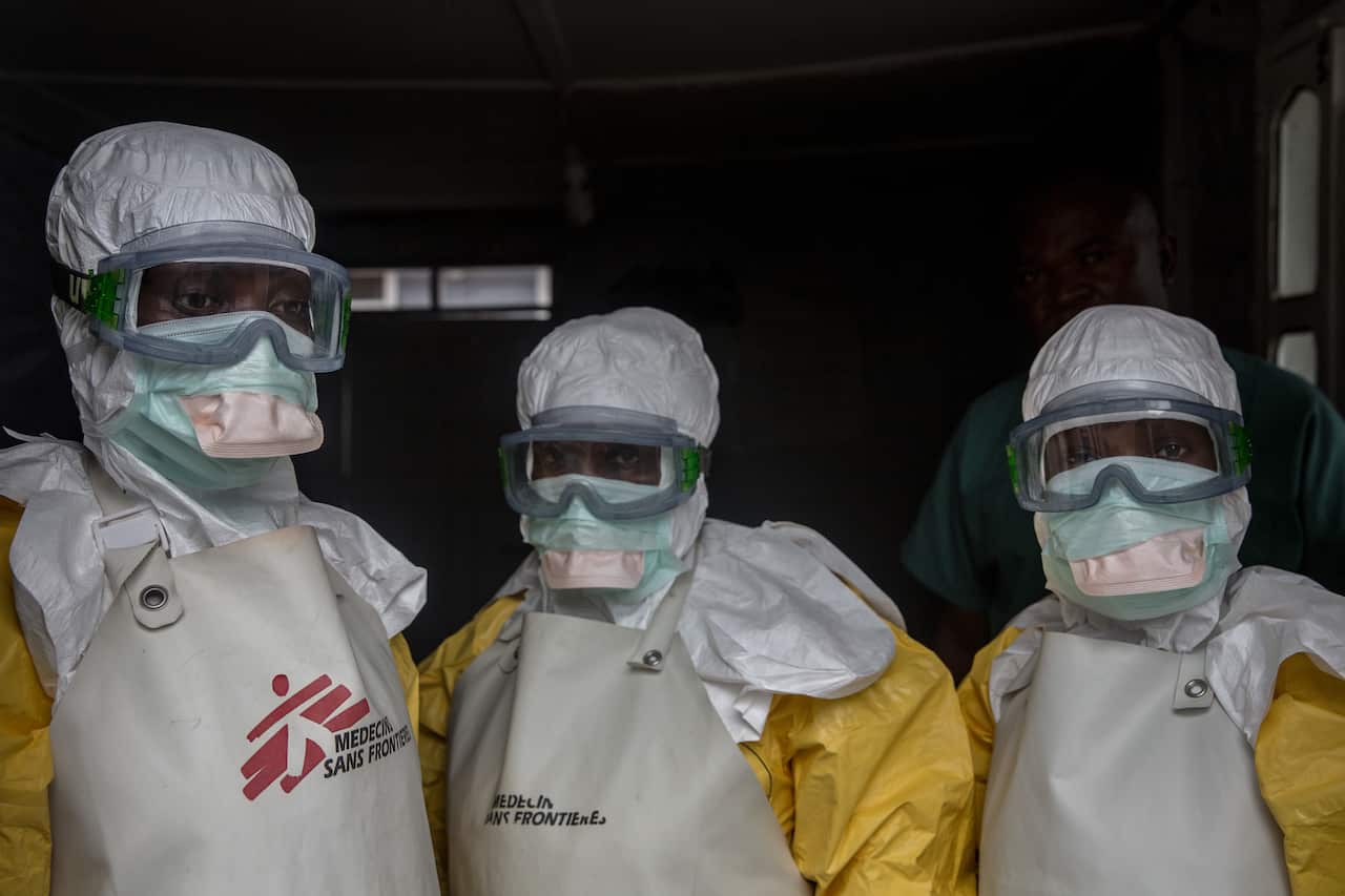 A file photo of medical staff dressed in protective gear before entering an isolation area at an Ebola treatment centre in Goma. DR Congo.