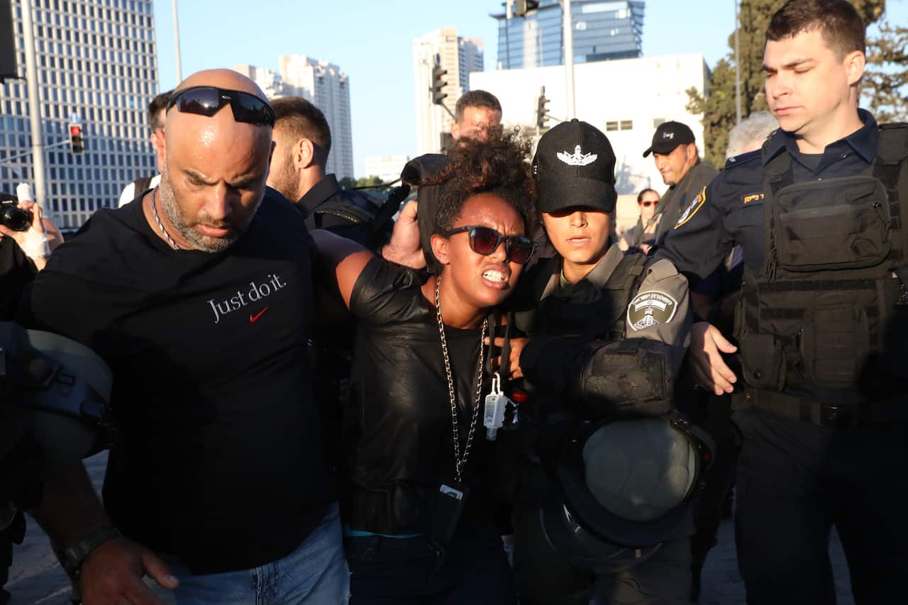 Protesters rally in support of Solomon Tekah, who was killed by an off-duty police officer, in Tel Aviv, Israel on July 03, 2019.