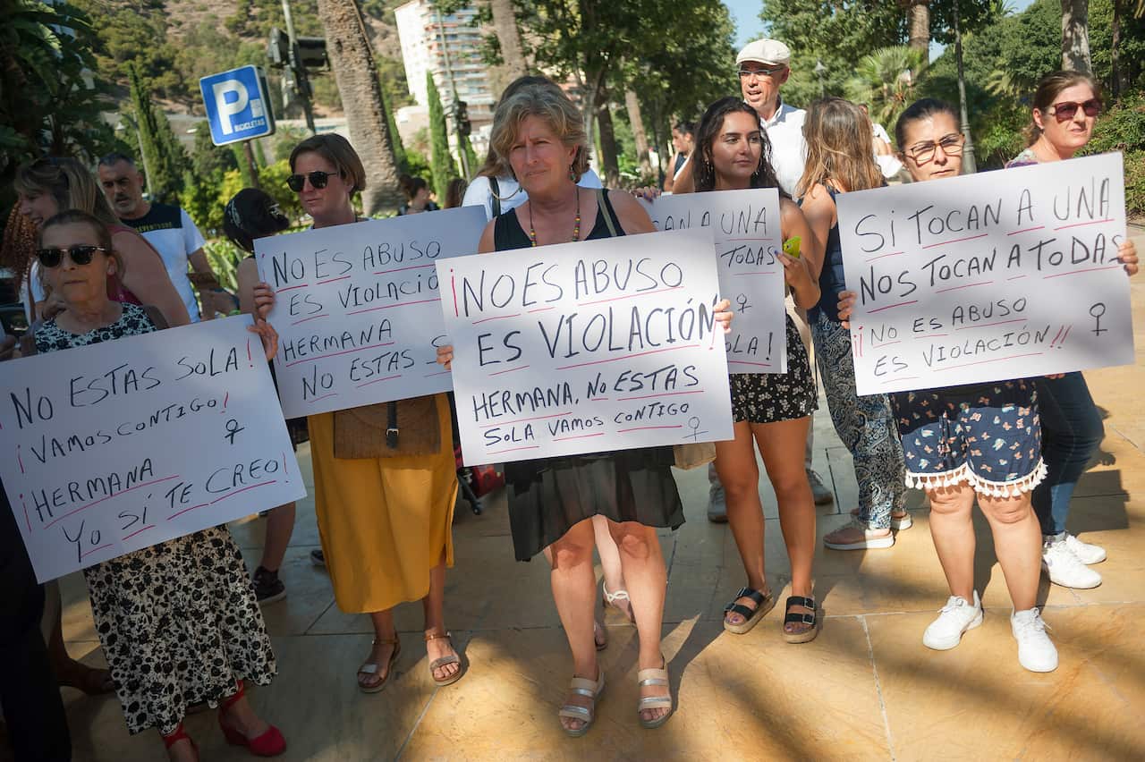 Women hold placards during the demonstration in support of a young woman who was raped by seven men in Manresa.