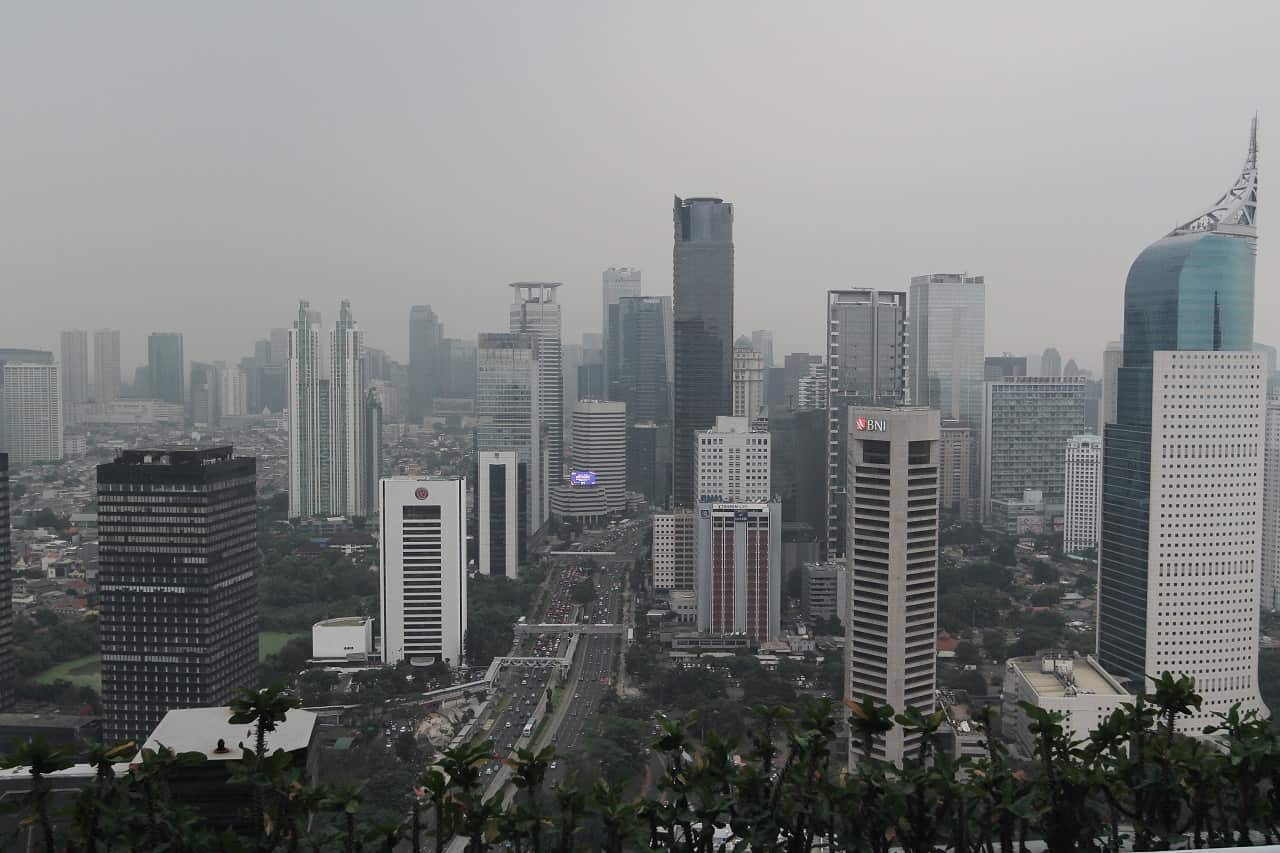 Pollution creates a haze over Jakarta.