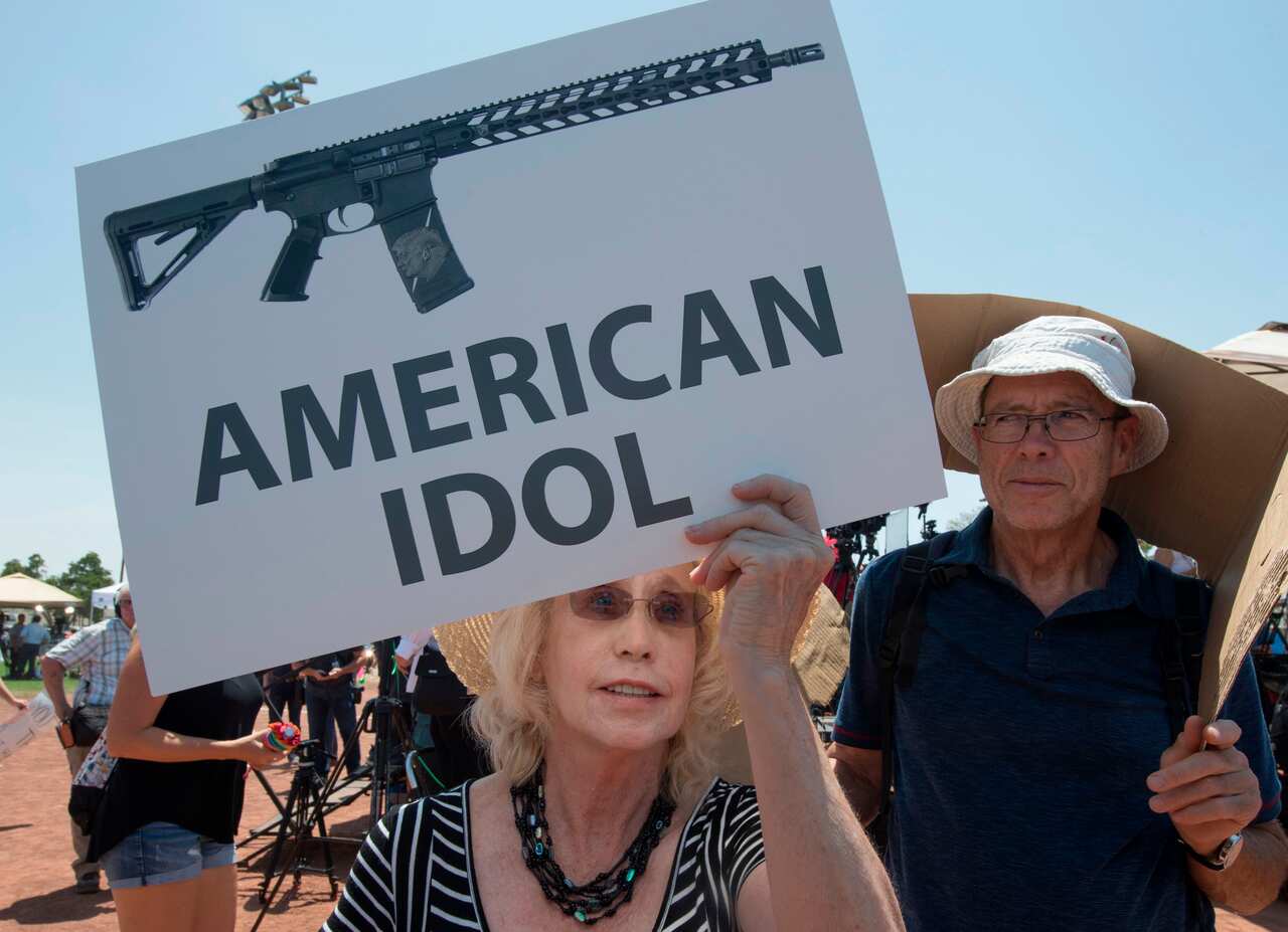 Residents protest against the visit of US President Donald Trump to the city after the Walmart shooting that left a total of 22 people dead, in El Paso, Texas.