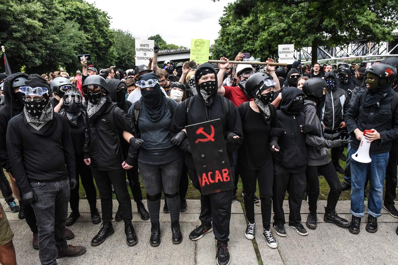 Members of Antifa line up during an alt-right rally in Portland, Oregon.