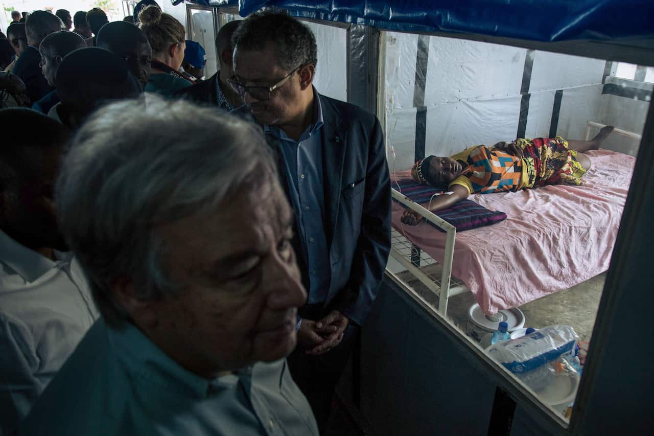 A patient lies on a bed as United Nation Secretary-General Antonio Guterres visits an Ebola treatment centre in Mangina, North Kivu province, September 2019.