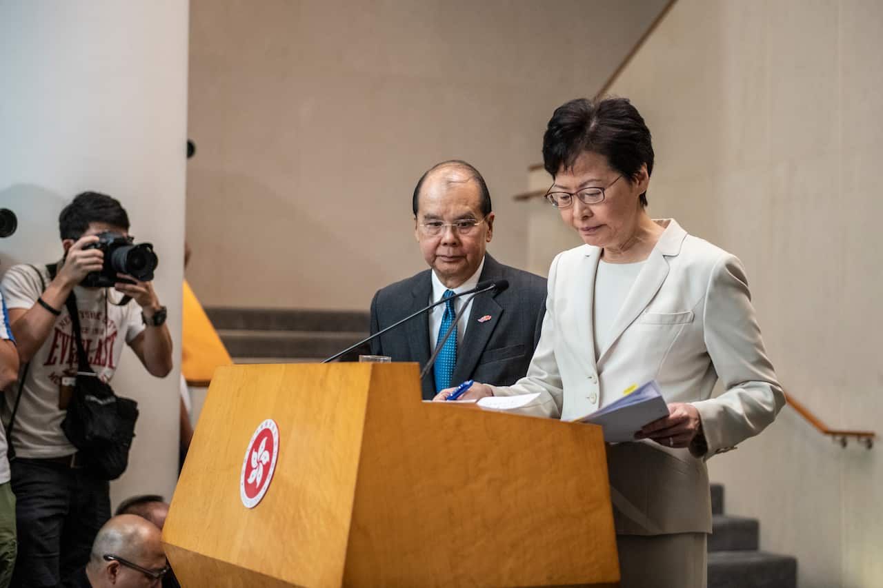 Hong Kong Chief Executive Carrie Lam (R) and Chief Secretary for Administration (L) Matthew Cheung.