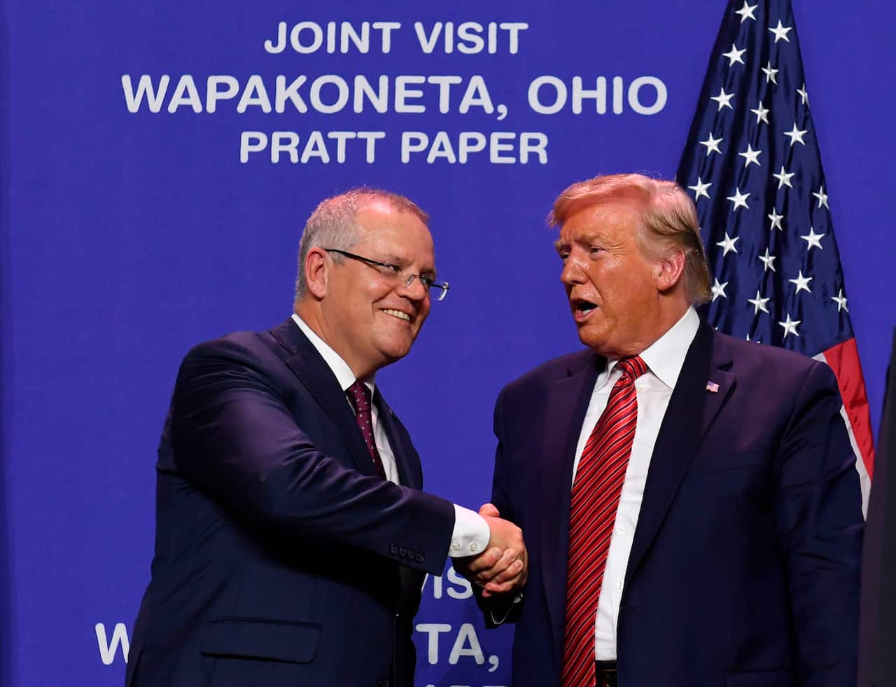 Prime Minister Scott Morrison and US President Donald Trump shake hands during a visit to Pratt Industries' plant opening in Wapakoneta, Ohio.