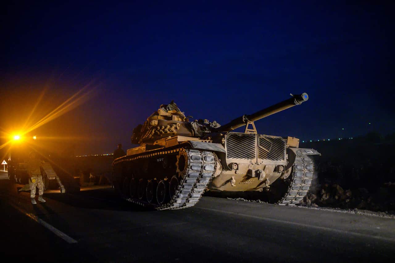 A Turkish army's tank drives towards the border with Syria near Akcakale in Sanliurfa province.
