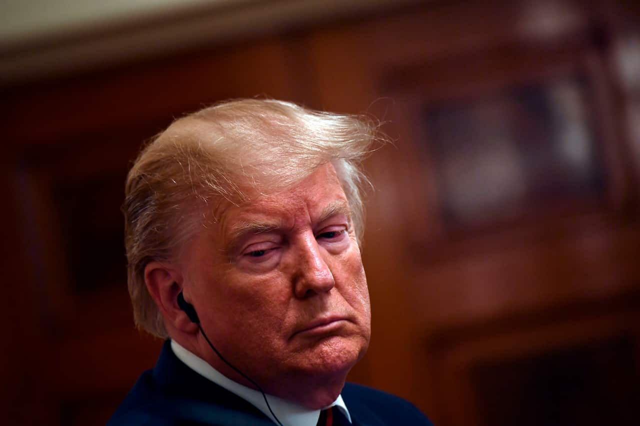 Dozens of the US president's fellow Republicans joined the majority Democrats in favour of voting to condemn the troop withdrawal.