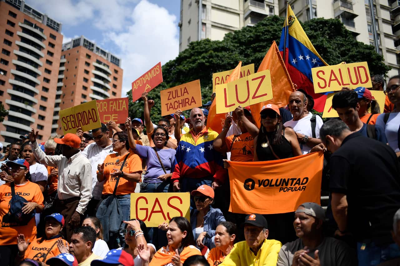 Venezuelan opposition demonstrators protest against against the President Nicolas Maduro.