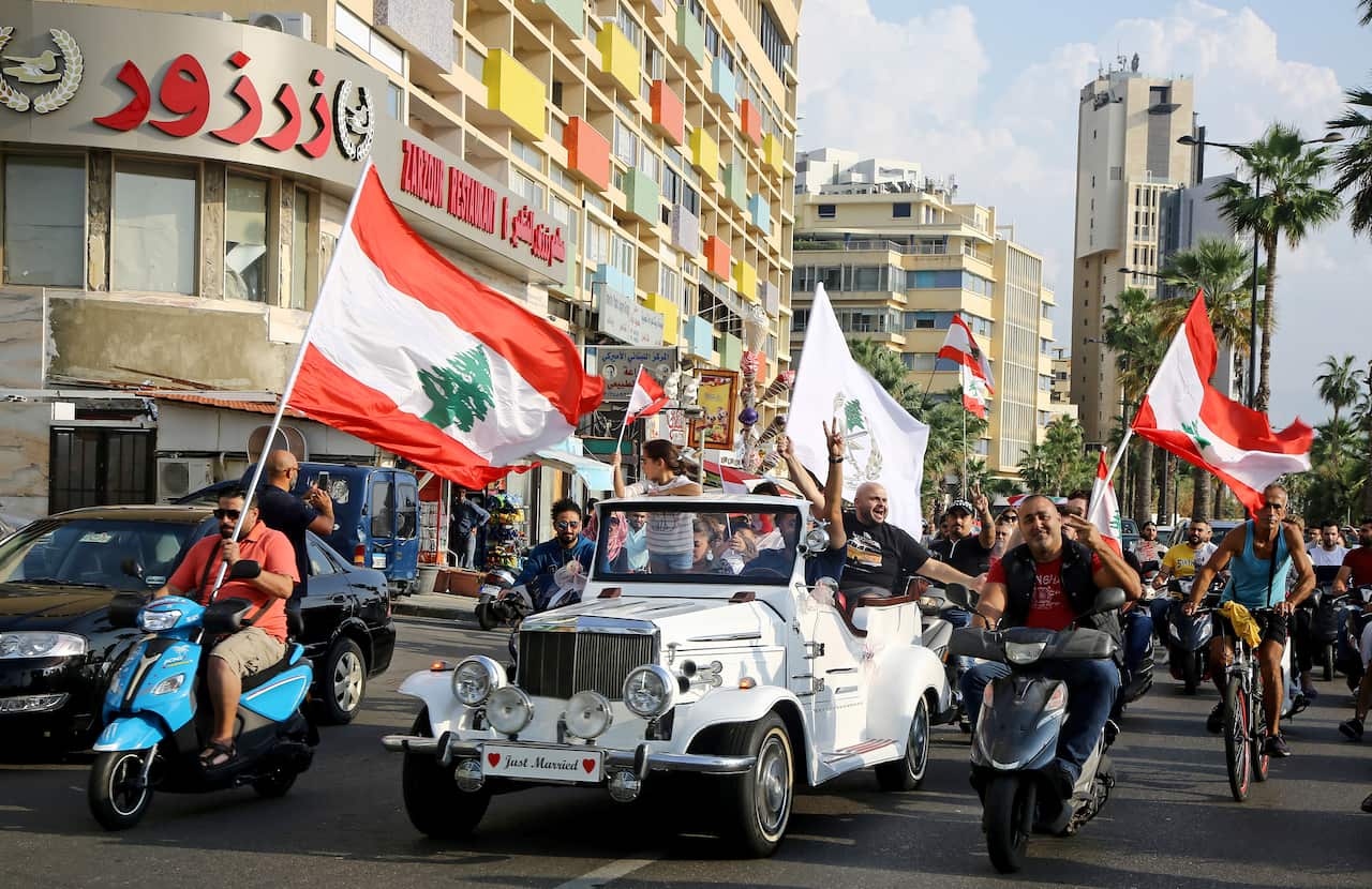 Protesters take to the streets on the eleventh day of anti-government rallies across Lebanon.