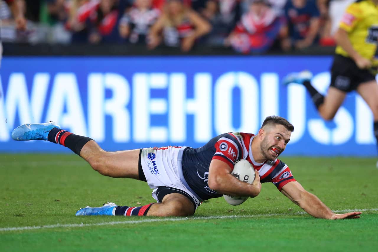 James Tedesco of the Sydney Roosters scores a try during the 2019 NRL Grand Final.