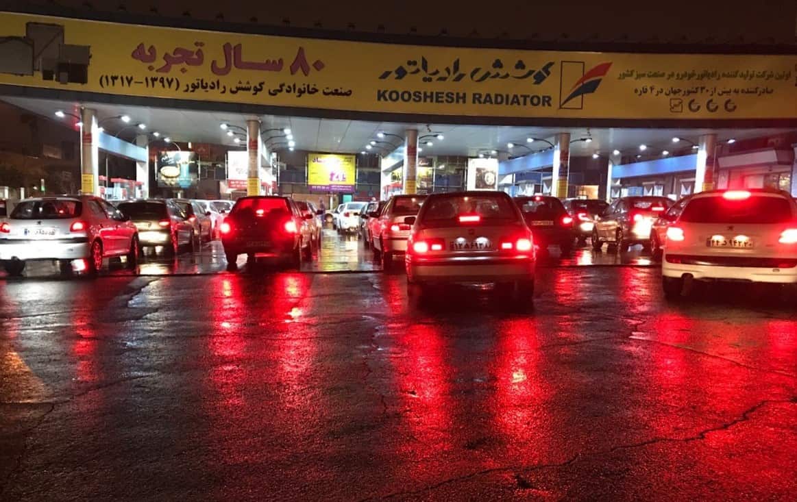 People arrive at gas stations to gas up as protests continue in Tehran, Iran on 18 November, 2019.