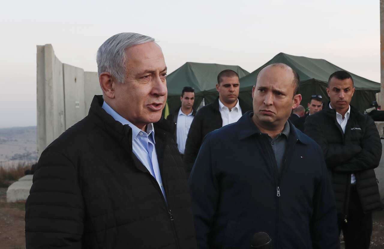 A file photo of Israel's Prime Minister Benjamin Netanyahu (L) and then-Defence Minister Naftali Bennett.