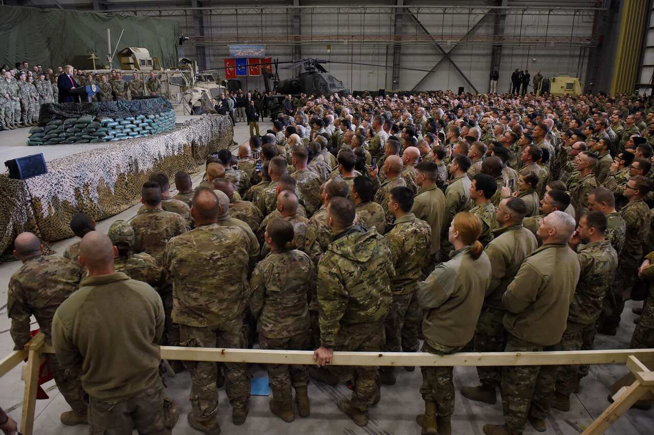 US President Donald Trump speaks to the troops during a surprise Thanksgiving day visit at Bagram Air Field.