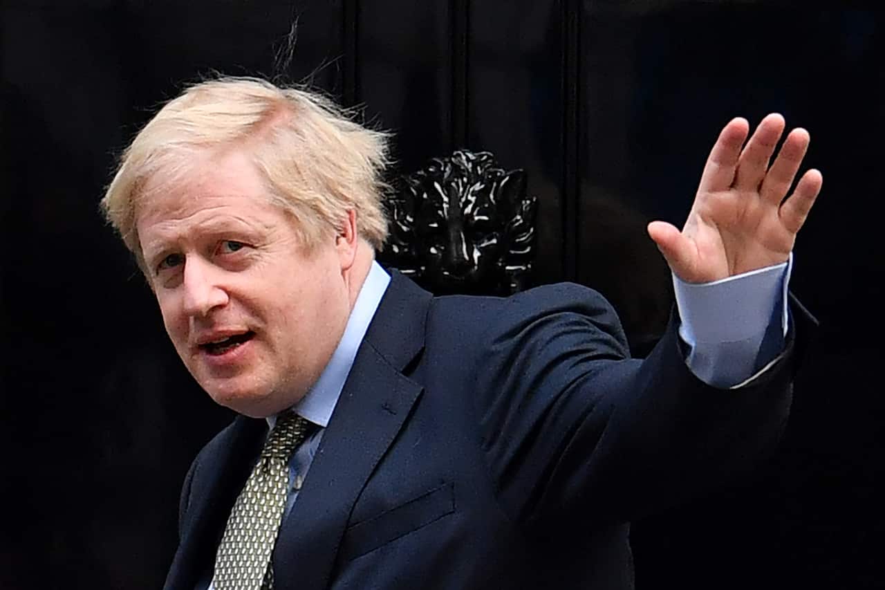 Britain's Prime Minister and Conservative Party leader Boris Johnson arrives at 10 Downing Street in central London.