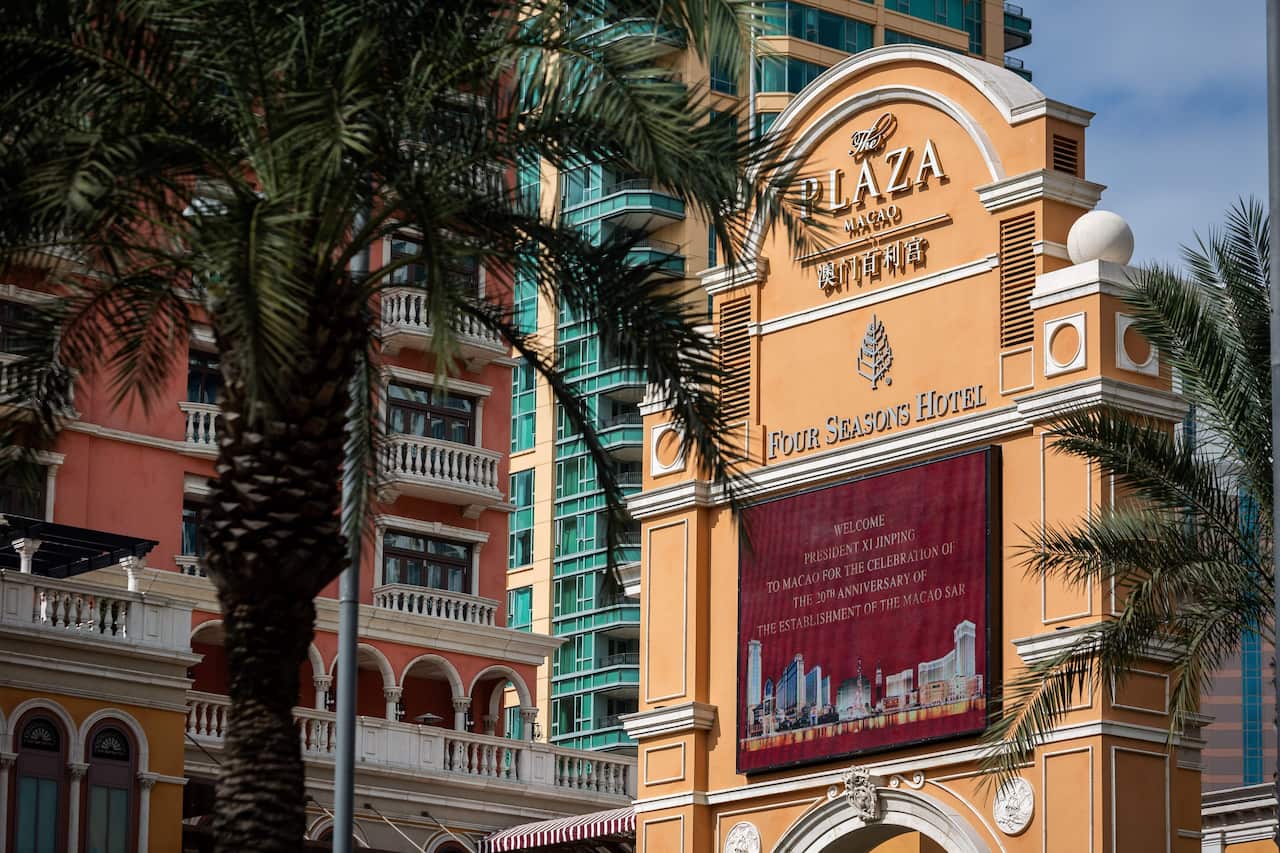 A screen on the Cotai strip in Macau previews a visit by Chinese President Xi Jinping to celebrate the 20th anniversary of the handover from Portugal.