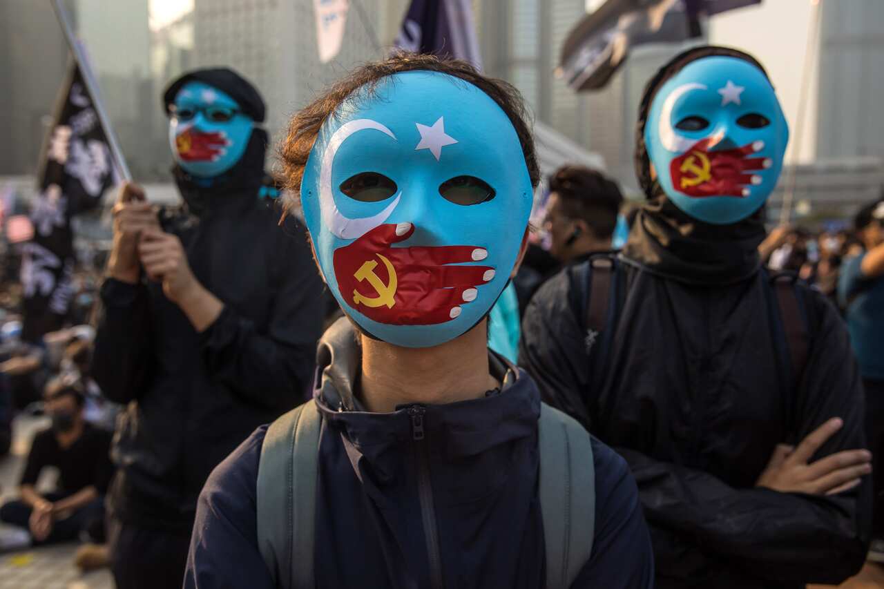 Protesters attend a rally in Hong Kong on 22 December, 2019, to show support for the Uighur minority in China. 