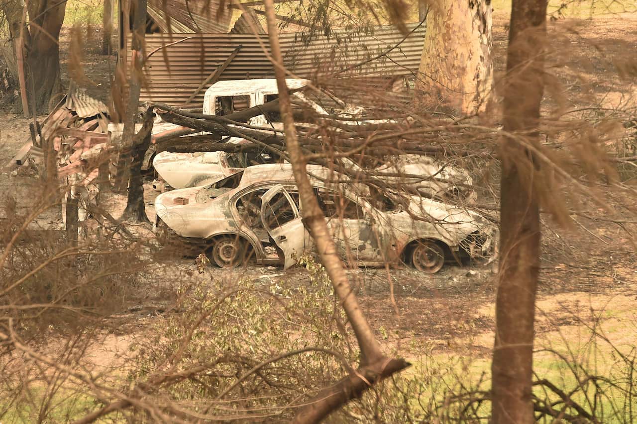Cars destroyed by bushfires in Mogo near Batemans Bay.