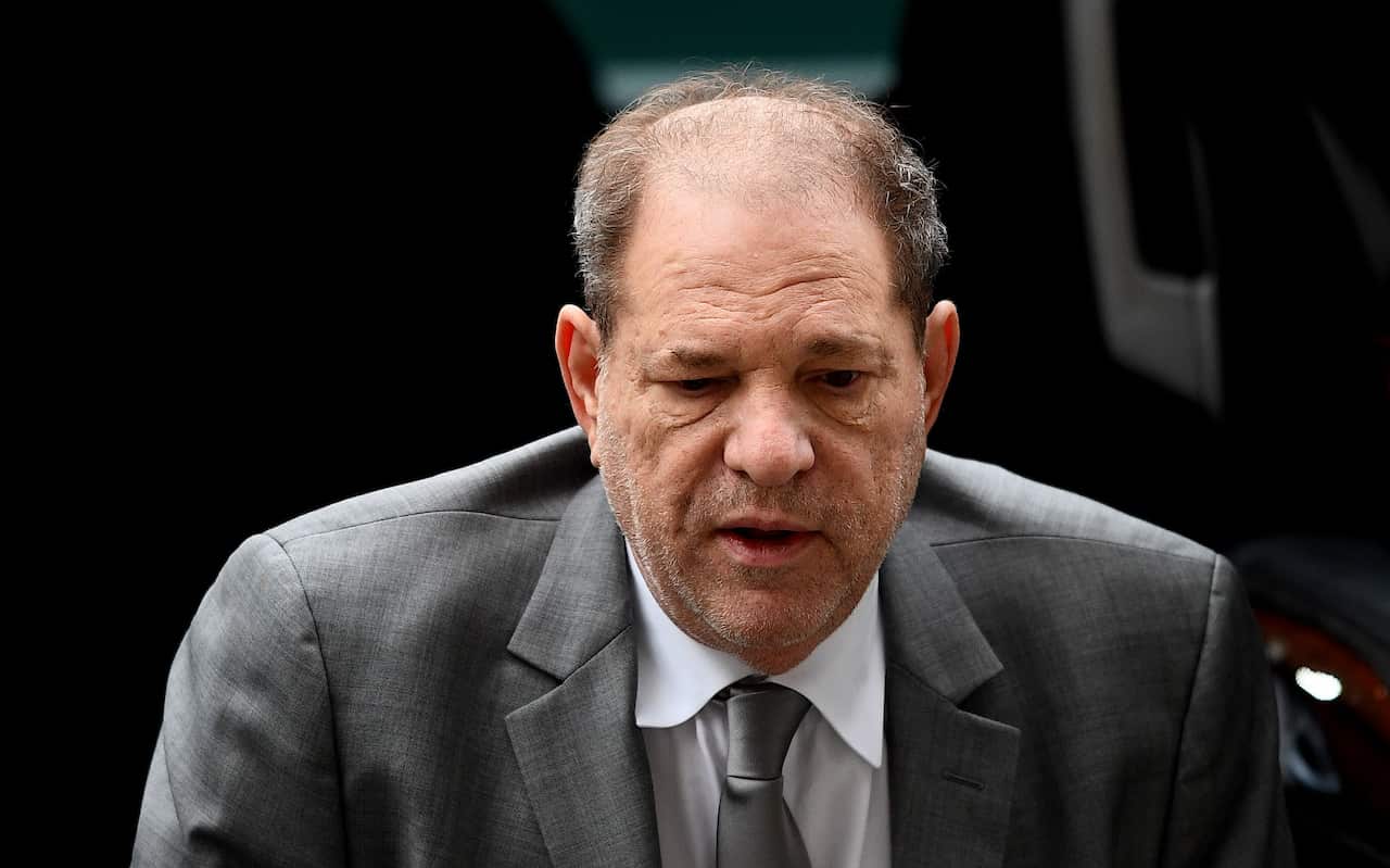 Harvey Weinstein uses a walker as he arrives at the Manhattan Criminal Court.