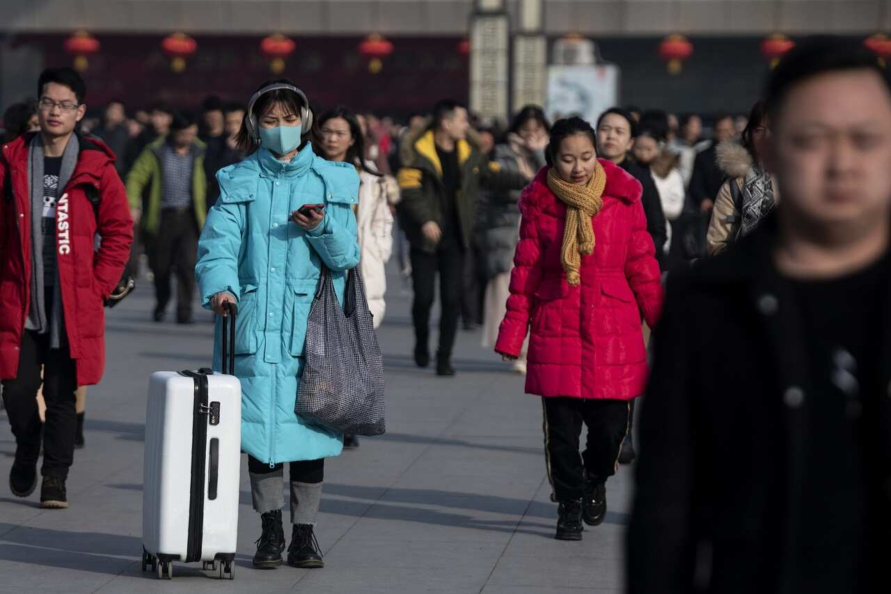 Passengers arrive at the train station in Hanzhong, a mountainous region of Shaanxi province.
