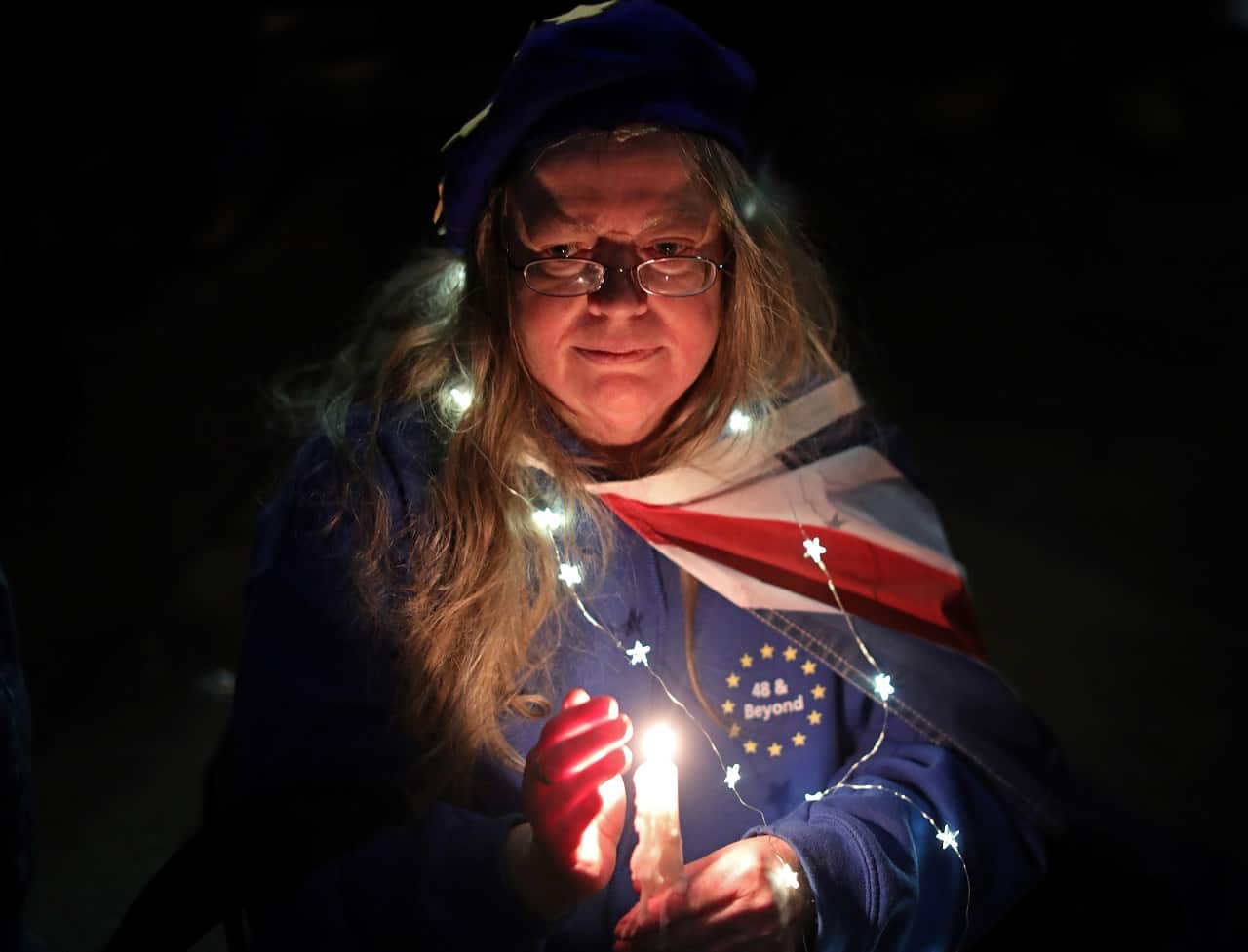 Anti-Brexit activists during a candlelight vigil.