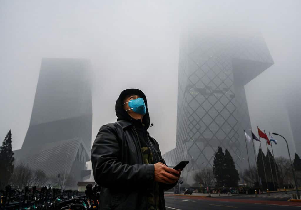 A man wears a face mask in Beijing