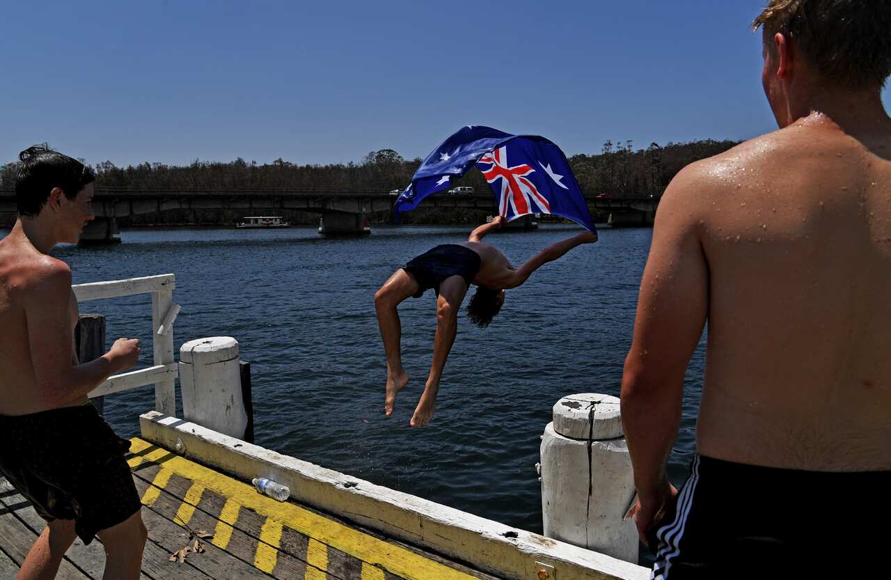 Local residents cool off in Clyde River near Batemans Bay.