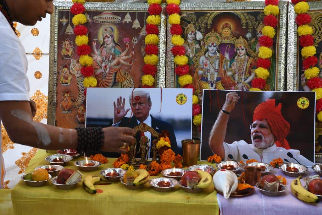 A Hindu priests seeks blessings from gods and to protect India and the United States of America.