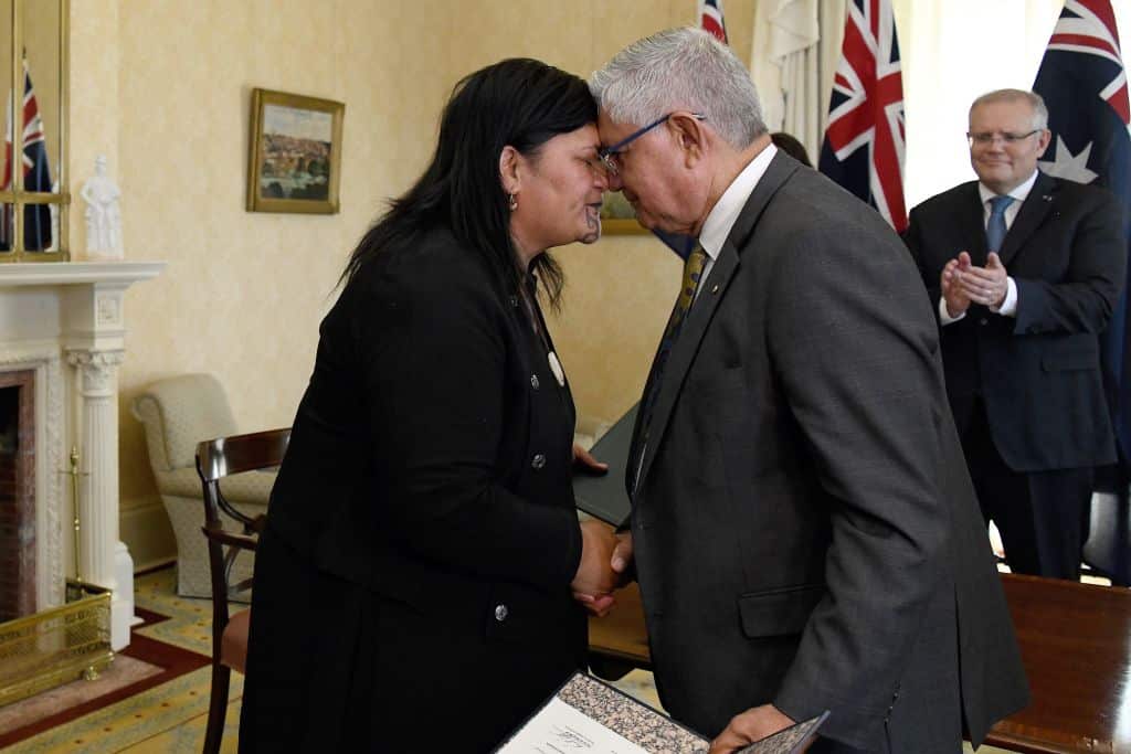 Ms Mahuta, then Minister of Maori Development and Australia's Minister for Indigenous Australians Ken Wyatt perform a traditional Maori welcome on 28 February.