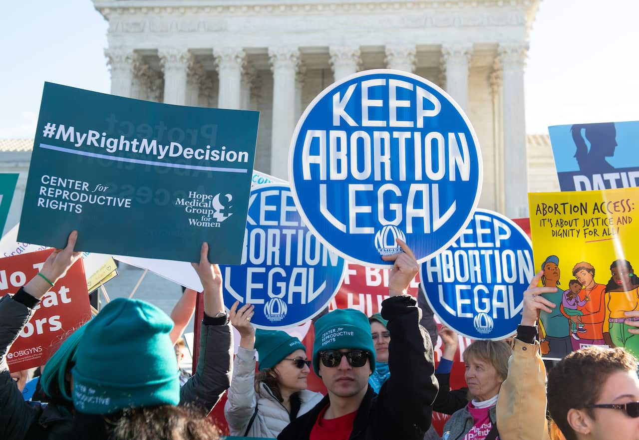 Abortion rights activists protest outside the US Supreme Court in Washington. 