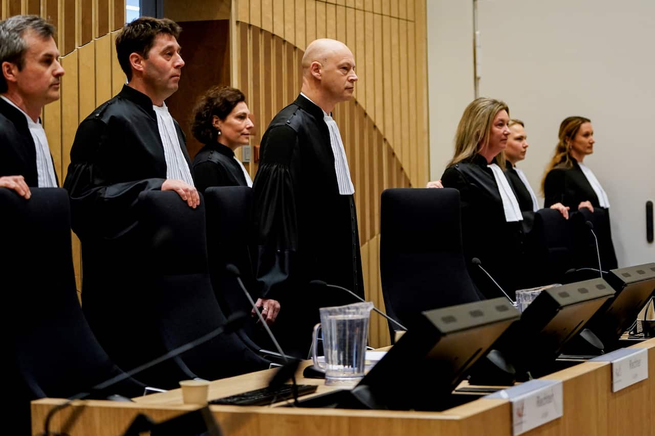 Chairman of the MH17 trial chamber Hendrik Steenhuis LLM (C) at the Schiphol courthouse.