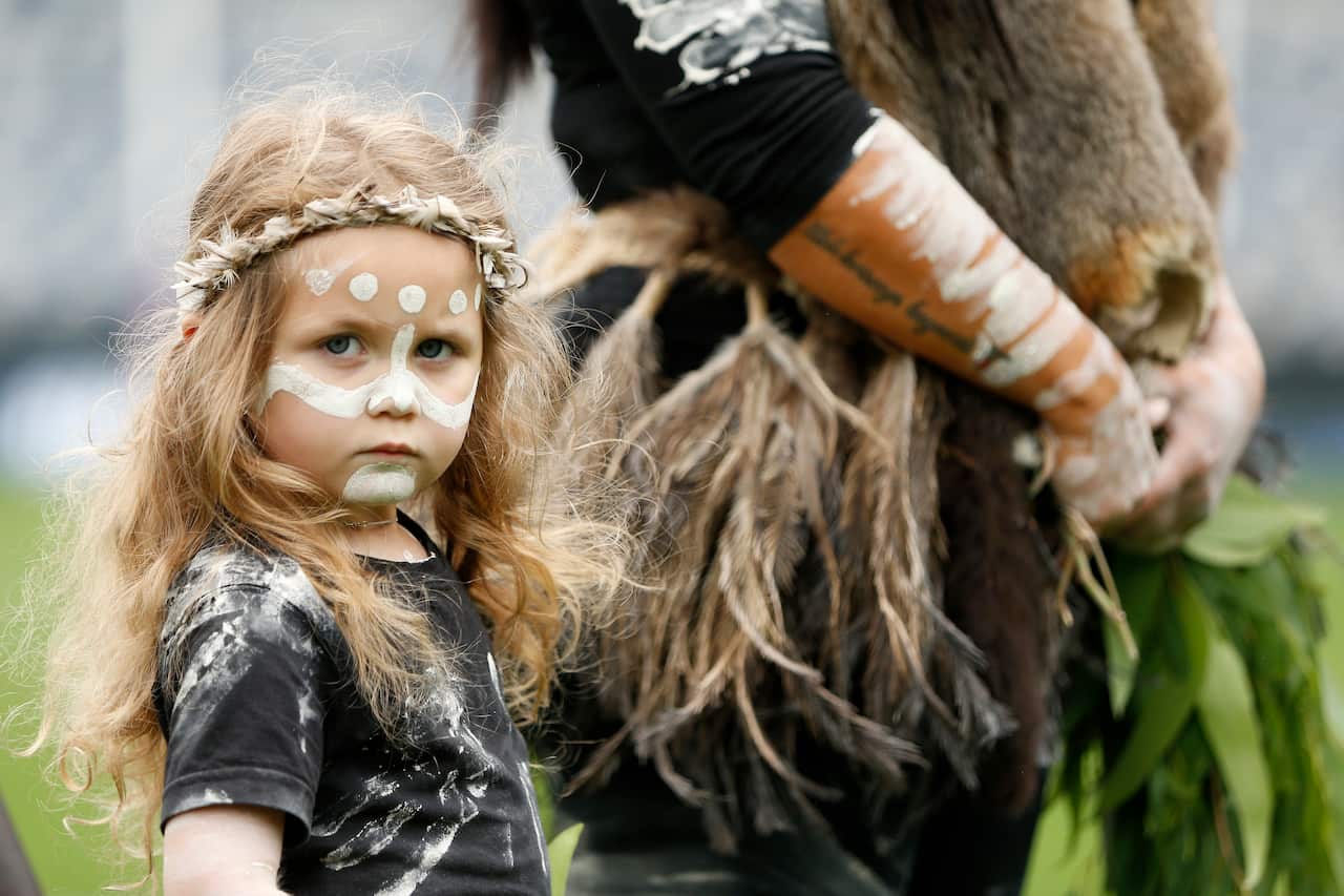 A Welcome to Country is performed before an AFLW match in Geelong in February. 