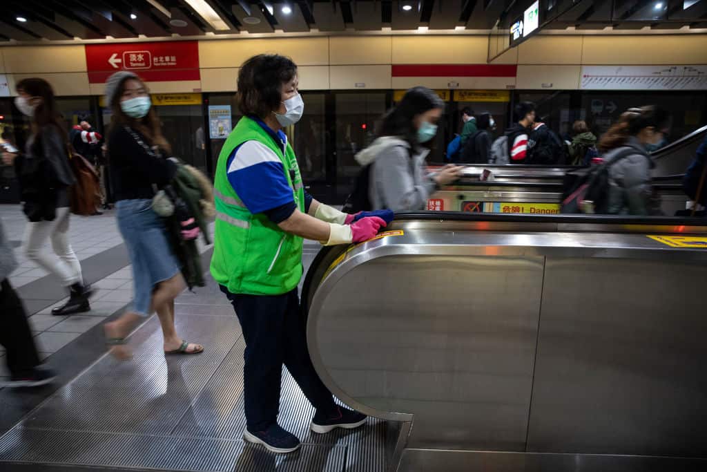 A metro cleaner works at a station on March 19, 2020.