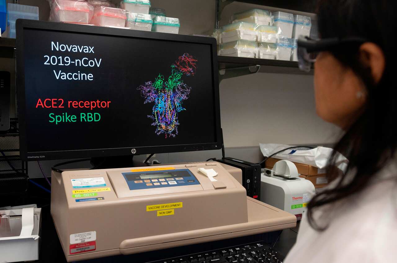 Dr Nita Patel looks at a computer model showing the protein structure of a potential COVID-19, vaccine at Novavax labs in  Maryland on 20 March, 2020.