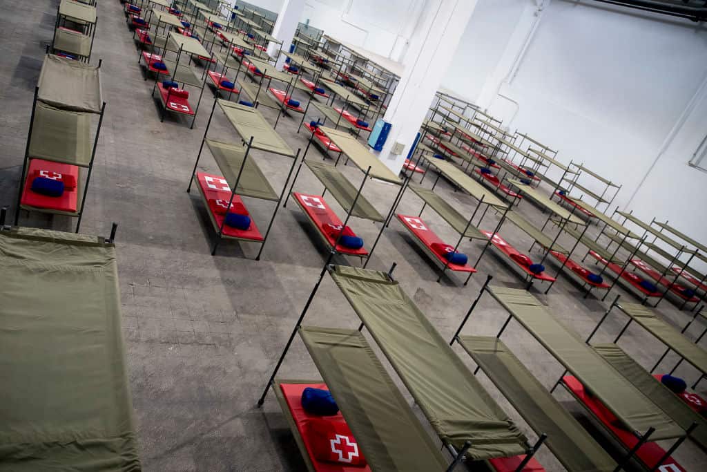 General view of beds set up at a temporary hospital for vulnerable people at the Fira Barcelona Montjuic centre in Barcelona