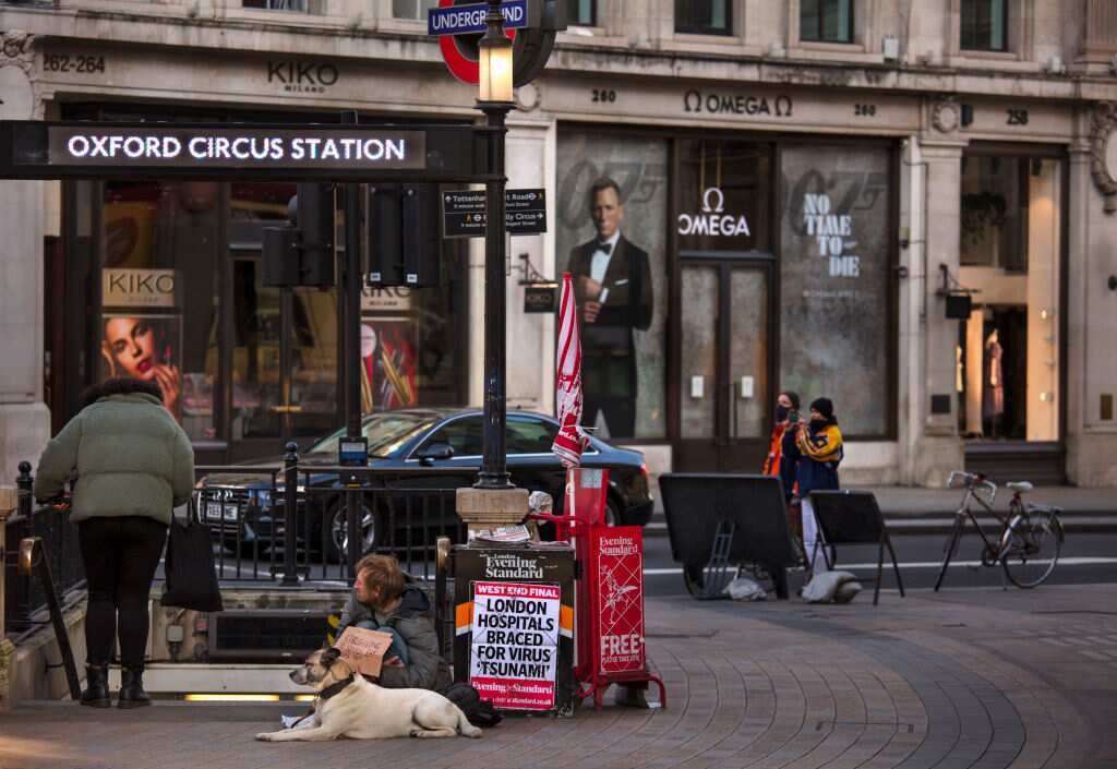 Homeless Man Begging At A Deserted Oxford Circus At Evening Rush Hour During Coronavirus Pandemic