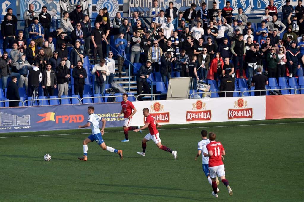 FC Minsk and FC Dinamo-Minsk team players vie for the ball during the Belarus Championship football match in Minsk