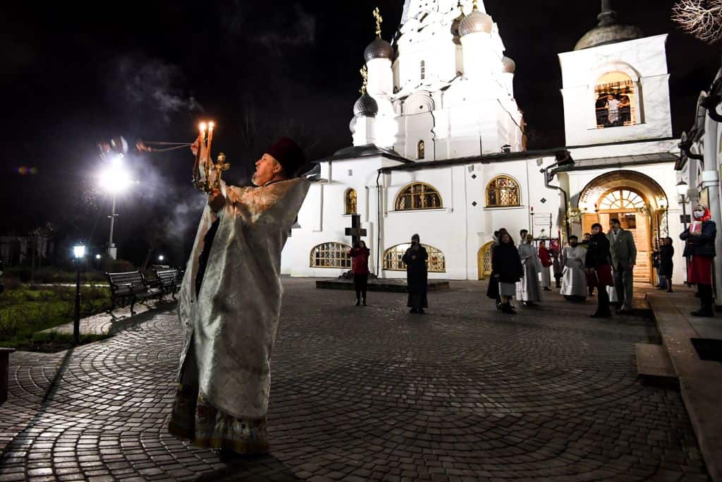 A Russian Orthodox priest conducts the Orthodox Easter service in a 17th century church on the outskirts of Moscow during a strict lockdown in Russia