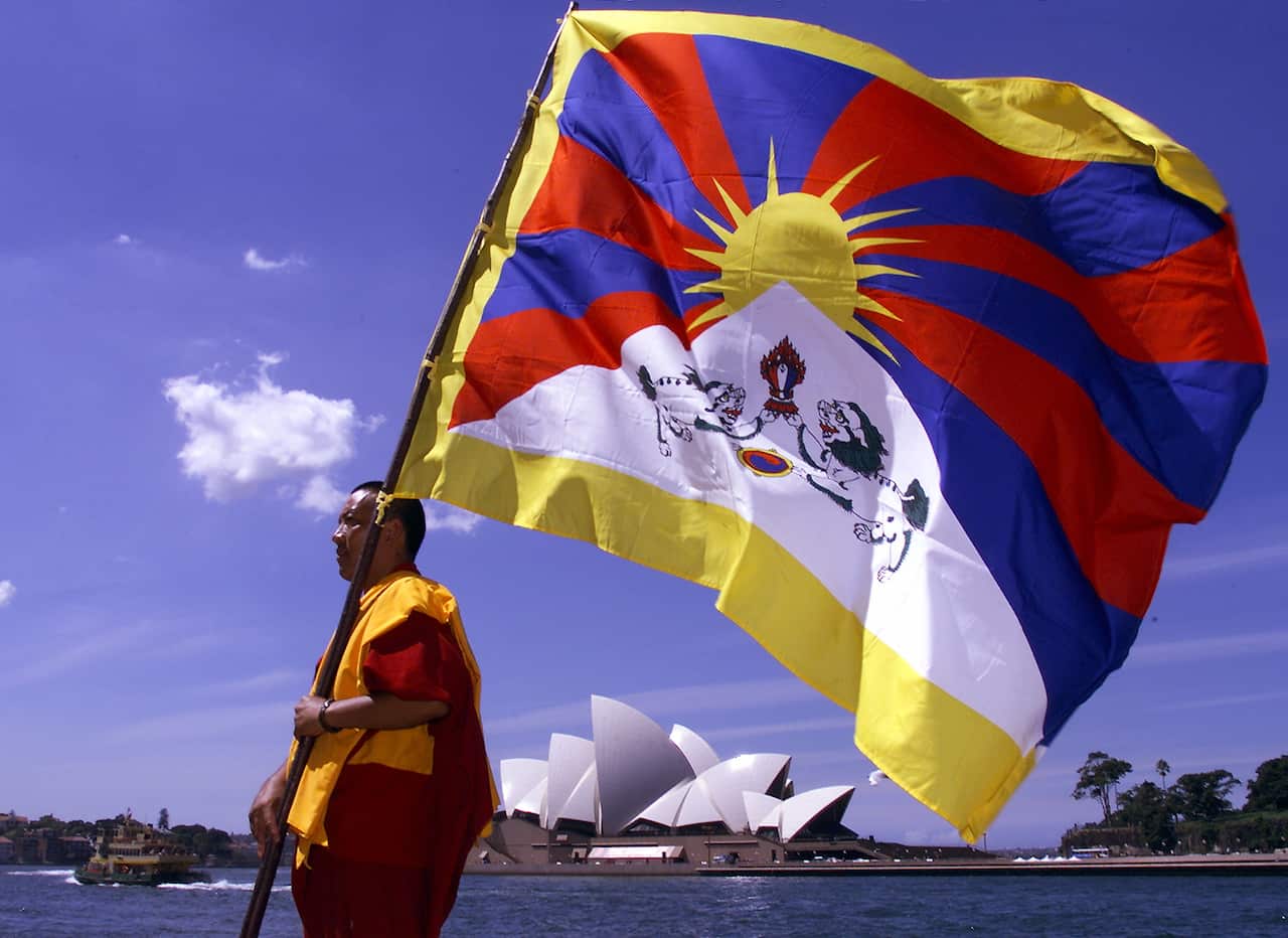 A Tibetan flag is carried in Sydney in 1999. 