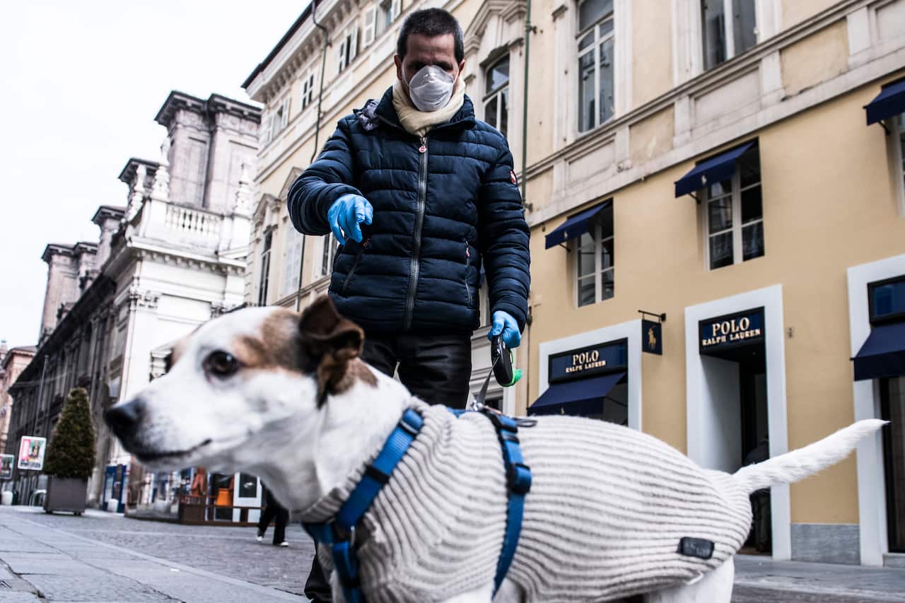 A man and his dog in Italy.