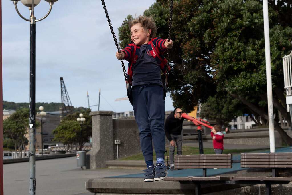 A child plays on a swing at a park in Wellington on May 14, 2020.