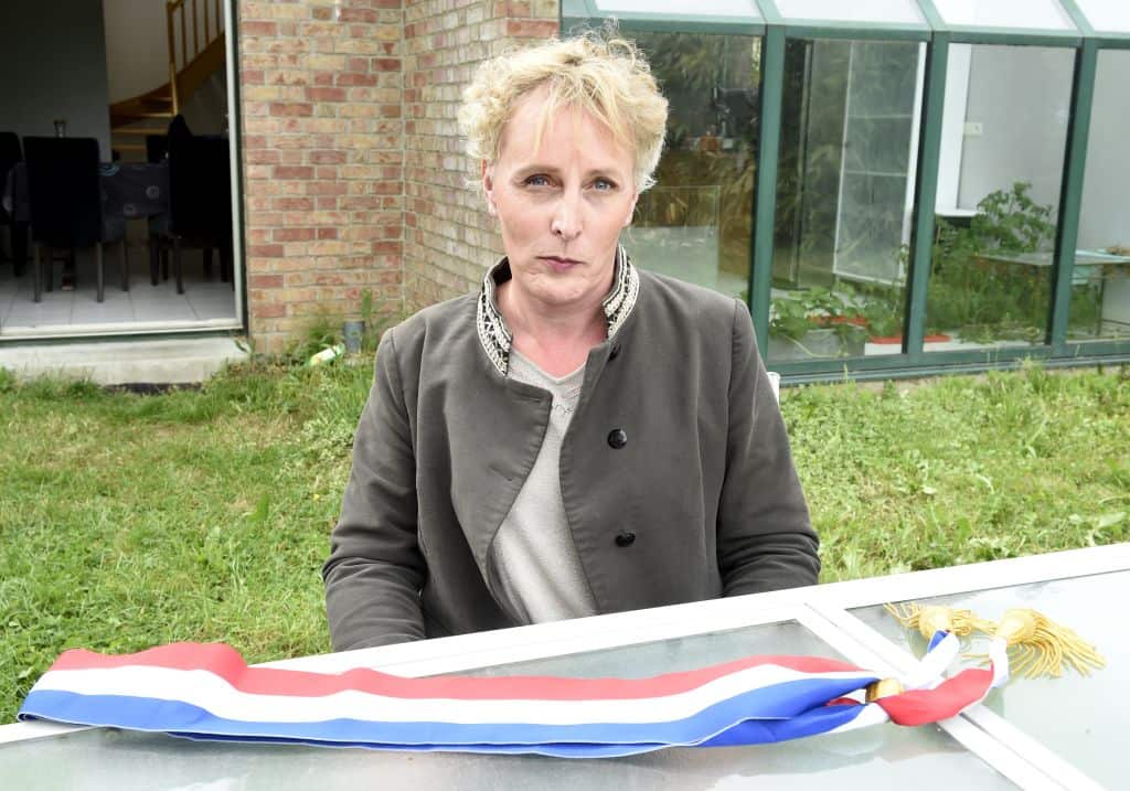 Marie Cau, the first transgender woman elected as a mayor in France, poses on 24 May, 2020 in her garden