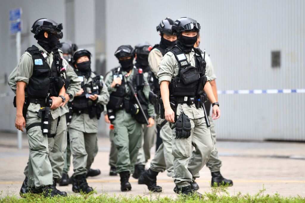 Riot police stand guard outside the Legislative Council in Hong Kong on 27 May, 2020.