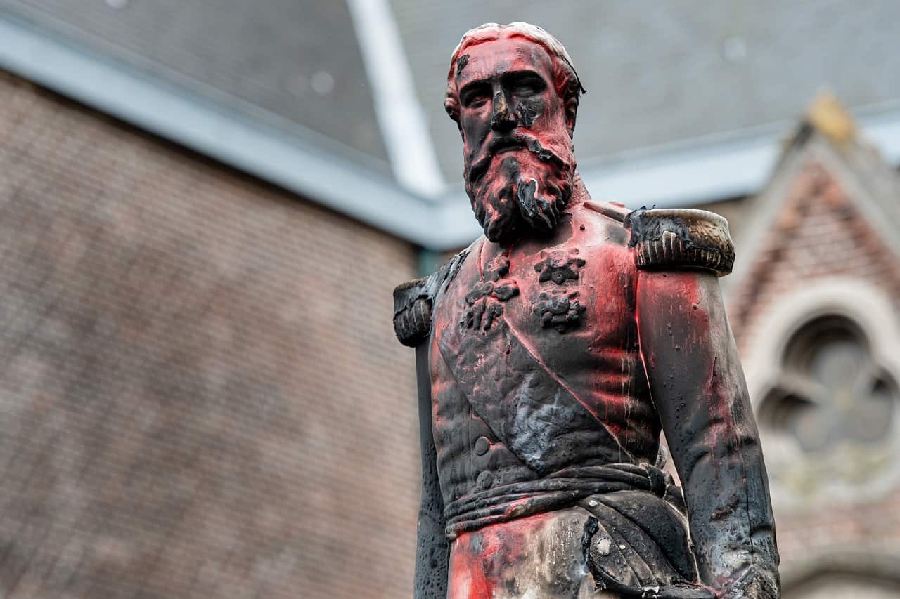 A damaged statue of King Leopold II in Belgium.