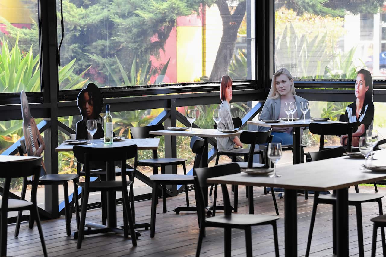 Cardboard cutouts in a Sydney restaurant.