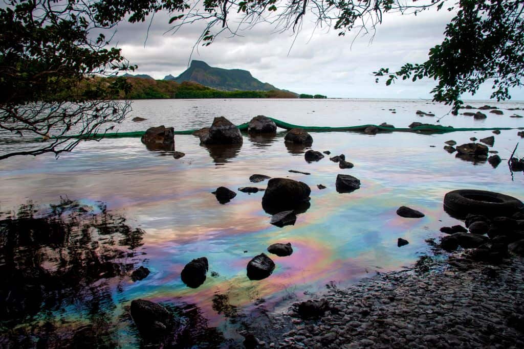 Iridescence on the water at the beach in Petit Bel Air