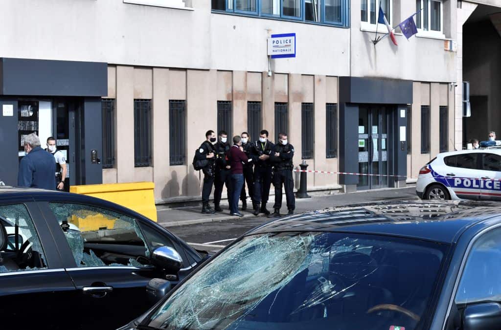 poOfficers stand outside the police station of Champigny-sur-Marne, outside Paris.